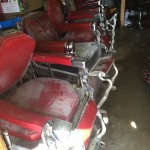 A line of barber chairs ready for fixing