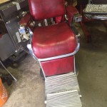 Red barber shop chair restored
